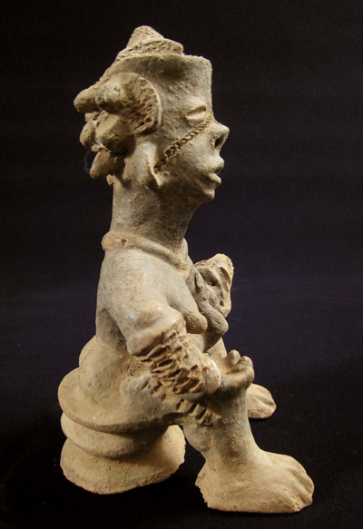 African Tribal Art - Terracotta maternity figure, Igbo, Nigeria, left