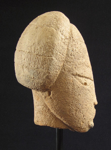 Tribal Art - Female Nok terracotta head, Nigeria, left