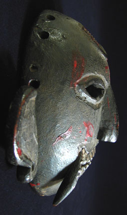 Asian Tribal Art - Lakhe mask, Kathmandu Valley, Nepal, left side