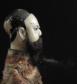 Asian Tribal Art - Male puppet, China, left side