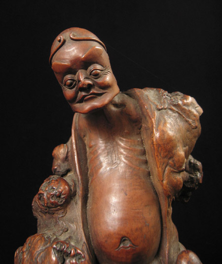 Asian Tribal Art - Male figure, China, detail