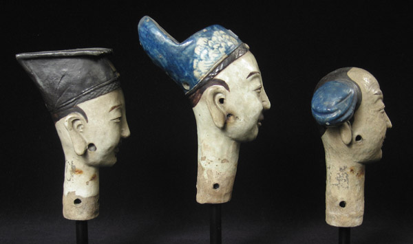Asian Tribal Art - Ceramic puppet heads, China, left