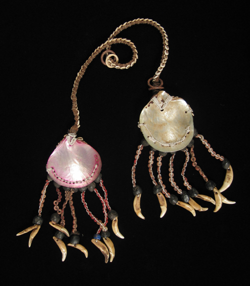 Oceanic Art - Shell ear ornaments, Collingwood Bay, Papua New Guinea, back